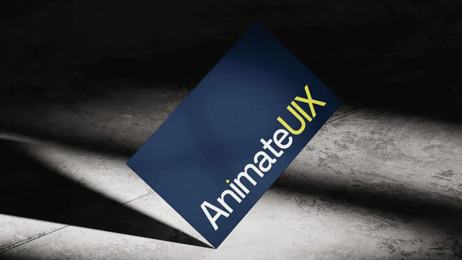 AnimateUIX brand card lit on concrete